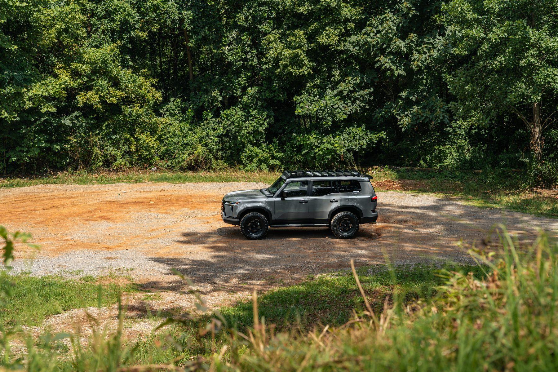 Lexus GX 550 with Milltek resonated cat-back exhaust on a gravel lot