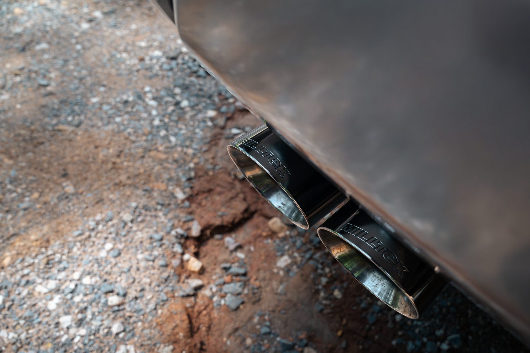 Close-up of Milltek branded GT-100 100mm polished tips on the Lexus GX 550