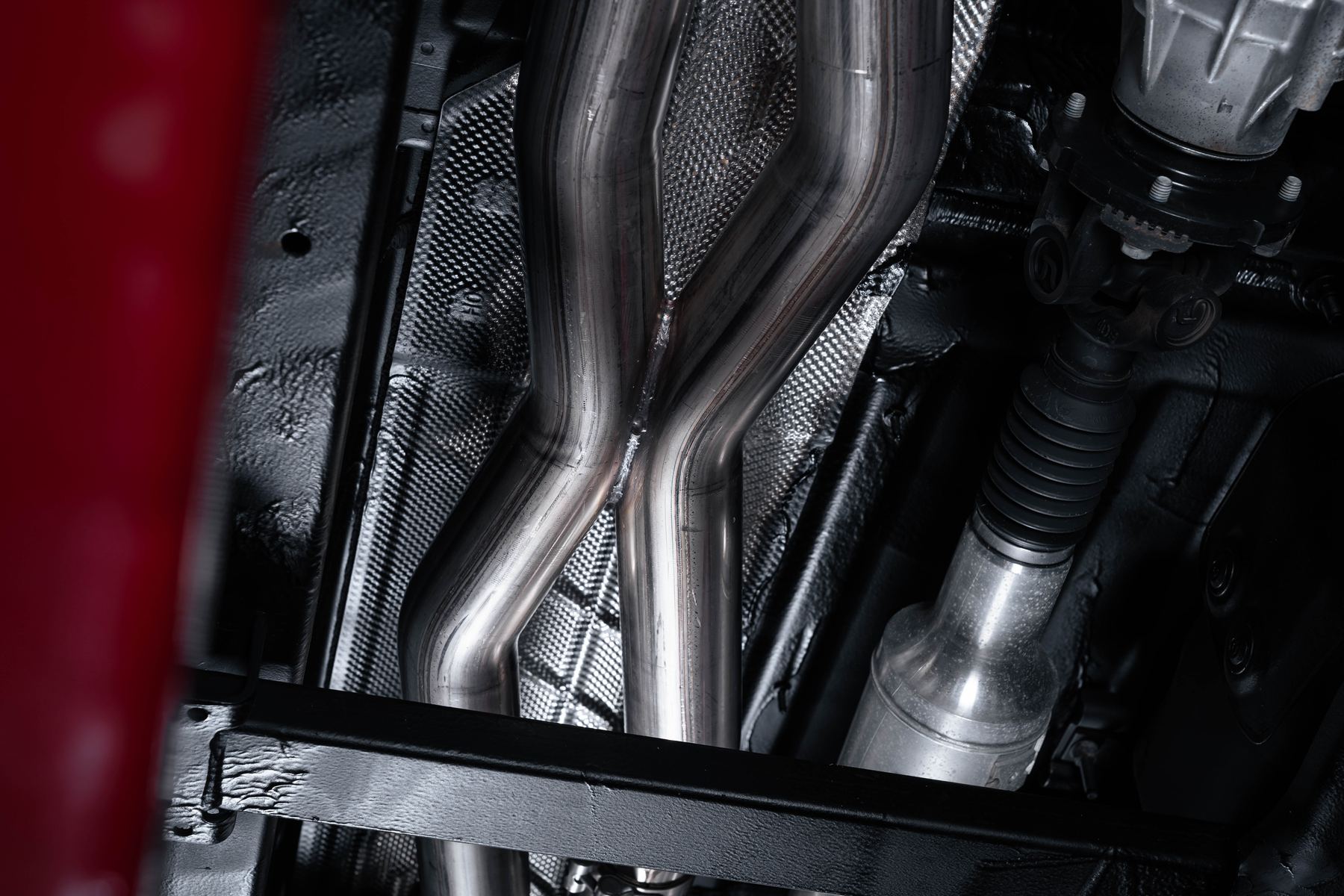 Milltek front X pipe and crossover section of the Ram 1500 RHO cat-back exhaust