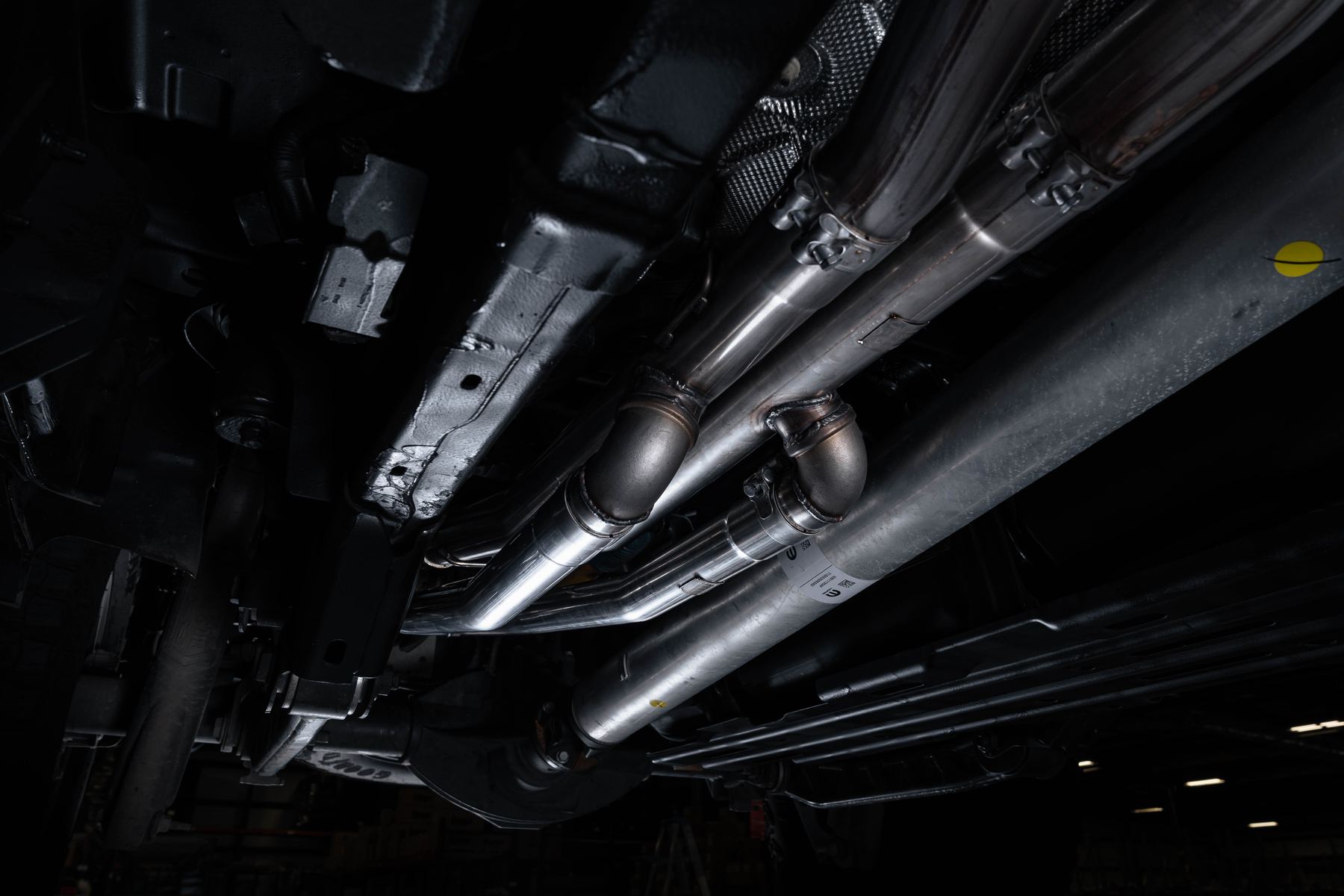 Milltek axle pipes and rear pipework running under the Ram 1500 RHO