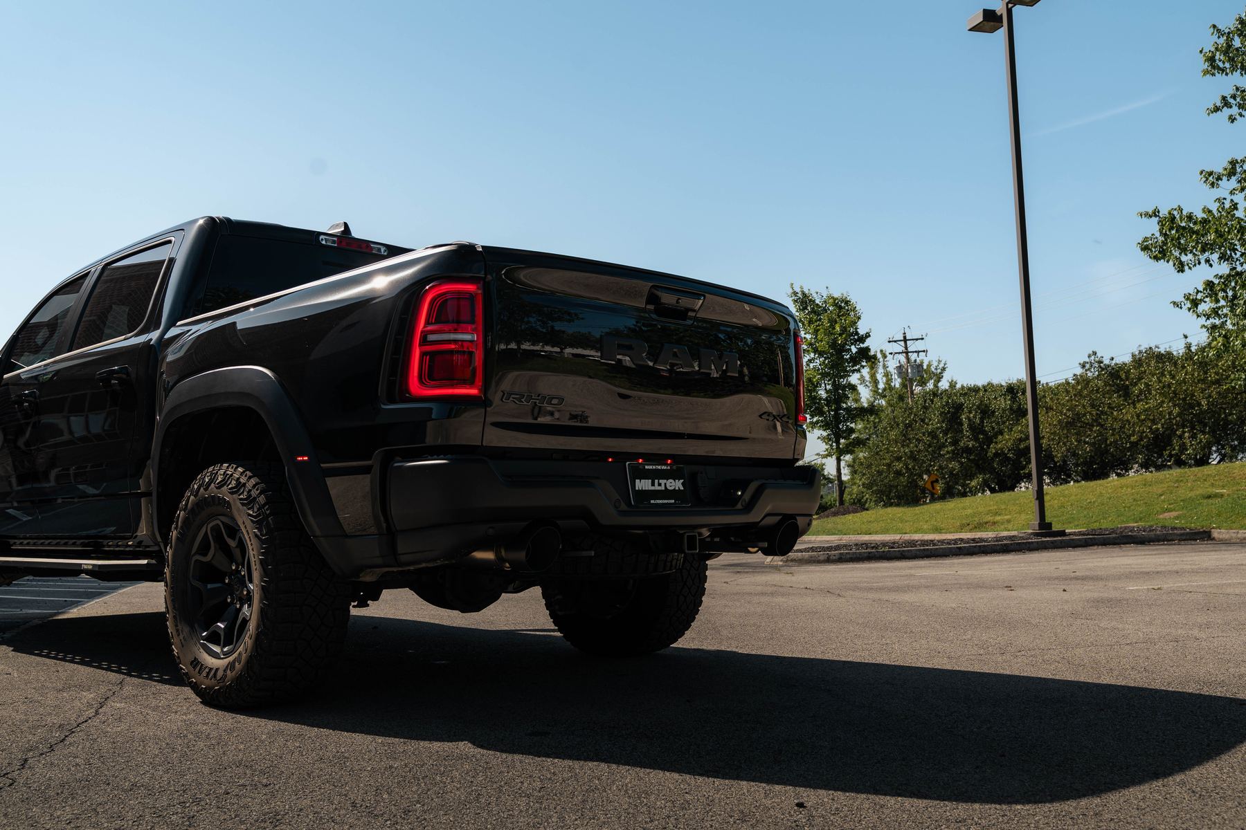 Rear three-quarter view of the Ram 1500 RHO with Milltek Cerakote Black exhaust tips